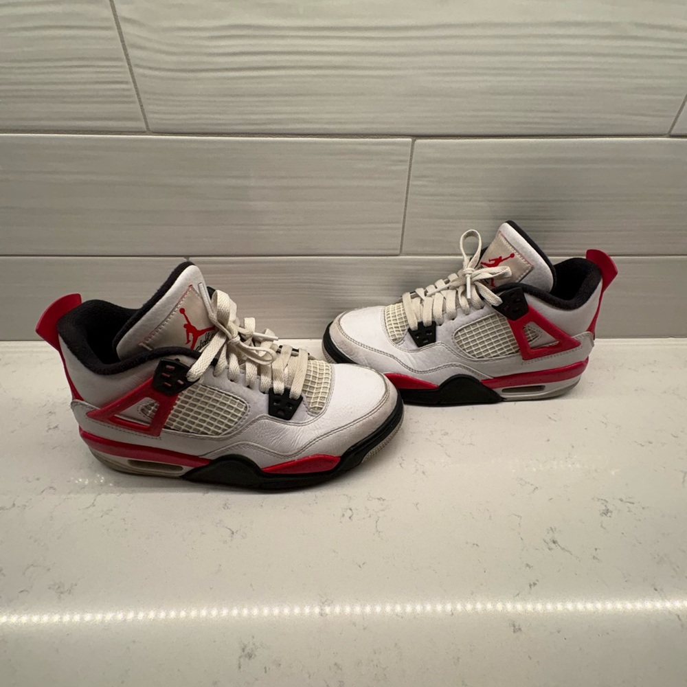 Nike Air Jordan 4 White and Red Sneakers